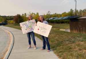 Teachers Welcoming Parents Into Parking Lot