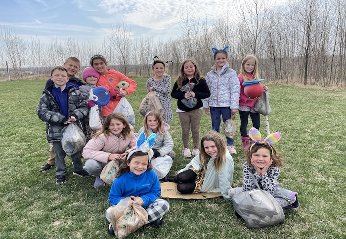 Second Graders Collecting Trash on Legacy's Property